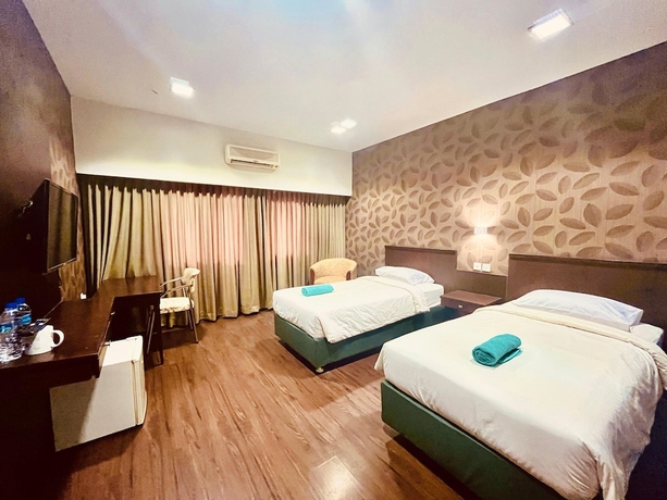 Imagen de la habitación del Hotel City, Klandasan Ulu. Foto 13