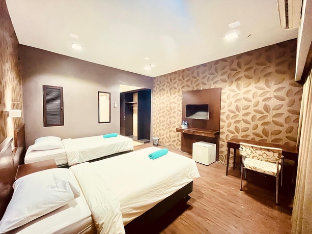 Imagen de la habitación del Hotel City, Klandasan Ulu. Foto 14