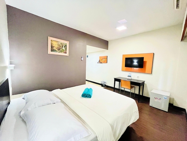 Imagen de la habitación del Hotel City, Klandasan Ulu. Foto 15