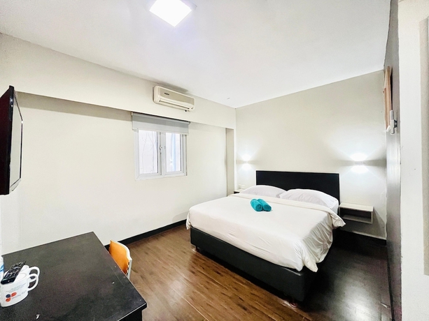Imagen de la habitación del Hotel City, Klandasan Ulu. Foto 16
