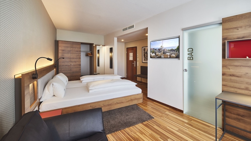 Imagen de la habitación del Hotel City Krone. Foto 11