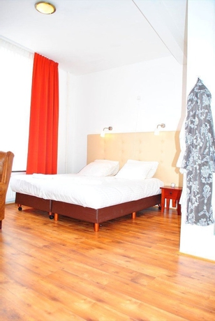 Imagen de la habitación del Hotel City Leiden. Foto 11