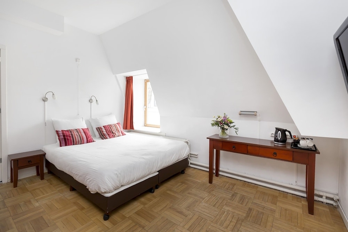 Imagen de la habitación del Hotel City Leiden. Foto 14
