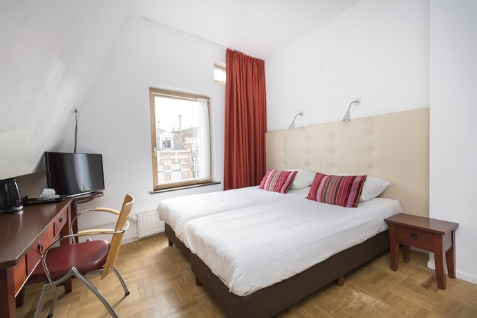 Imagen de la habitación del Hotel City Leiden. Foto 16