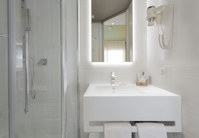 Imagen de la habitación del Hotel City Locarno, Design and Hospitality. Foto 4