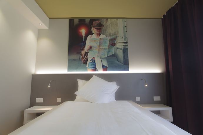 Imagen de la habitación del Hotel City Locarno, Design and Hospitality. Foto 6