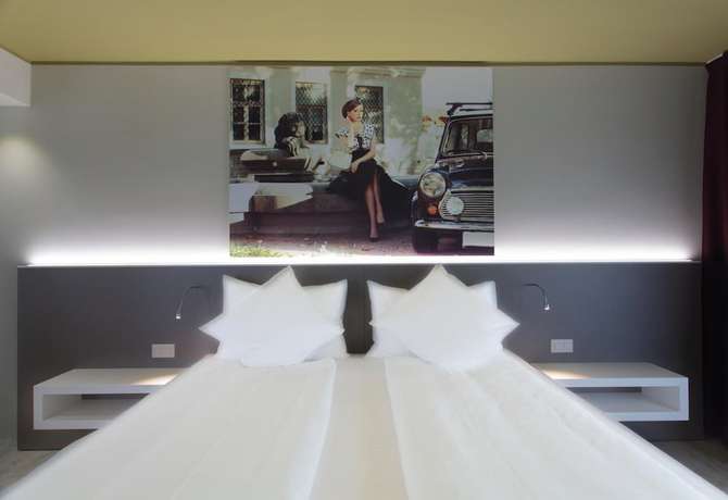 Imagen de la habitación del Hotel City Locarno, Design and Hospitality. Foto 7