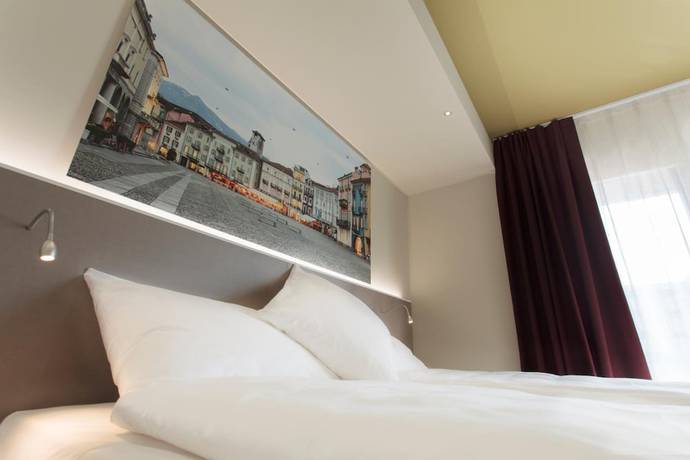 Imagen de la habitación del Hotel City Locarno, Design and Hospitality. Foto 11