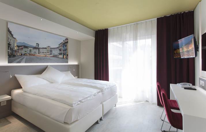 Imagen de la habitación del Hotel City Locarno, Design and Hospitality. Foto 12