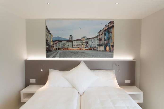 Imagen de la habitación del Hotel City Locarno, Design and Hospitality. Foto 13
