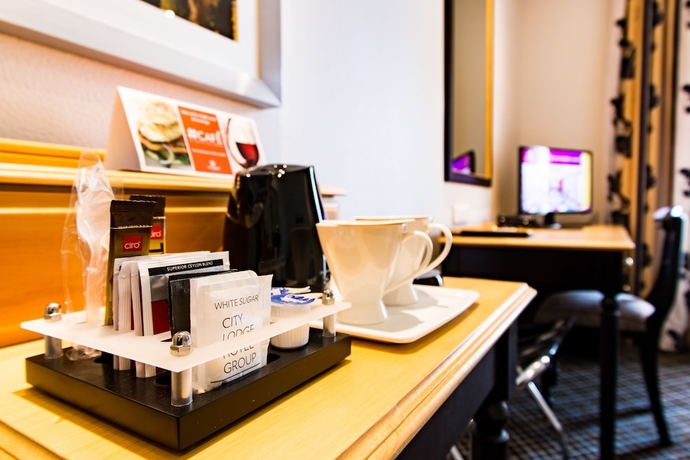 Imagen de la habitación del Hotel City Lodge Grandwest. Foto 9