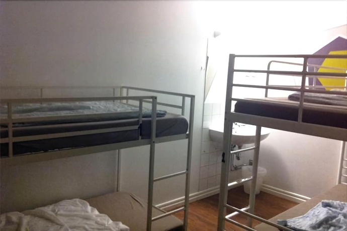 Imagen de la habitación del Hotel City Lodge Hostel. Foto 8