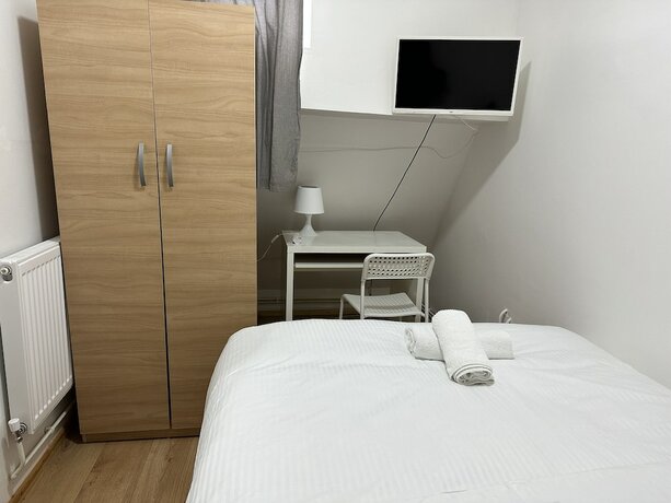 Imagen de la habitación del Hotel City Lodge Shadwell. Foto 14