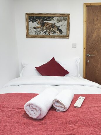 Imagen de la habitación del Hotel City Lodge Shadwell. Foto 18