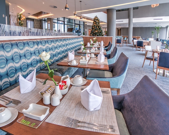 Imagen del bar/restaurante del Hotel City Lodge Waterfall City. Foto 2