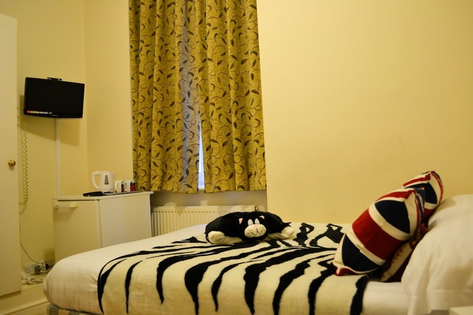 Imagen de la habitación del Hotel City London. Foto 7