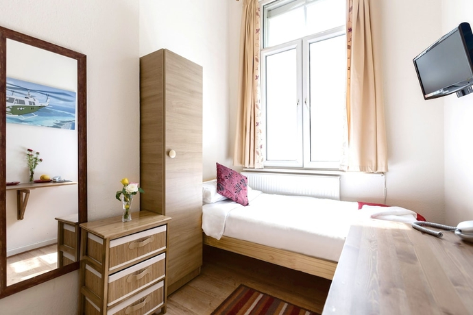 Imagen de la habitación del Hotel City London. Foto 9