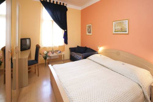 Imagen de la habitación del Hotel City Lounge Crown. Foto 10