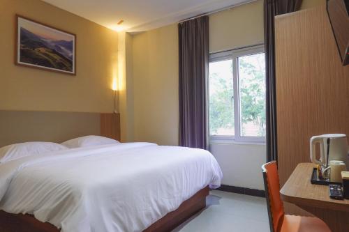 Imagen de la habitación del Hotel City Mataram. Foto 19