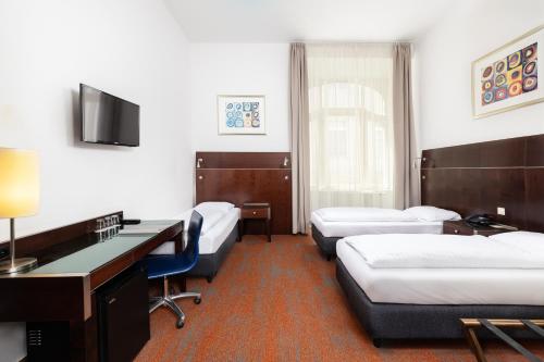 Imagen de la habitación del Hotel City Matyas. Foto 3