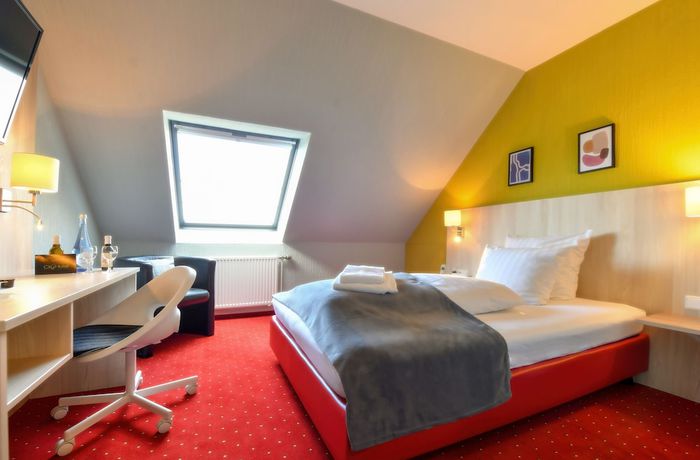 Imagen de la habitación del Hotel City Meckenheim. Foto 4