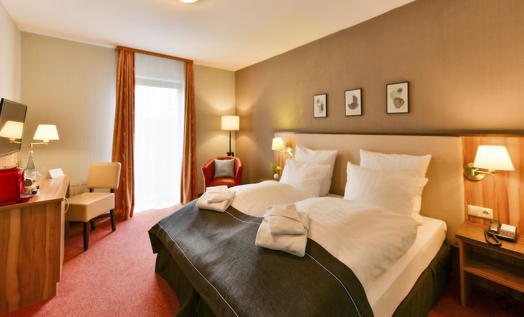 Imagen de la habitación del Hotel City Meckenheim. Foto 5