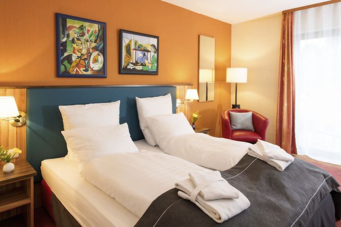 Imagen de la habitación del Hotel City Meckenheim. Foto 10