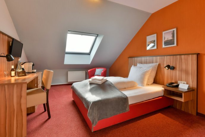 Imagen de la habitación del Hotel City Meckenheim. Foto 11