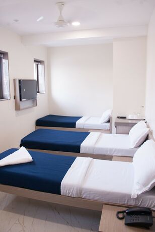 Imagen de la habitación del Hotel City, Mumbai. Foto 17