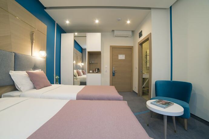 Imagen de la habitación del Hotel City Nest Modern and Cozy Suites. Foto 14