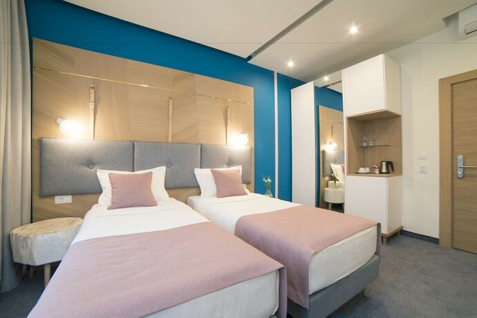 Imagen de la habitación del Hotel City Nest Modern and Cozy Suites. Foto 15