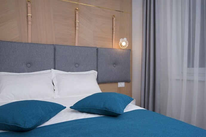 Imagen de la habitación del Hotel City Nest Modern and Cozy Suites. Foto 16