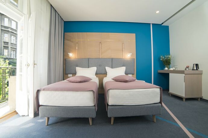 Imagen general del Hotel City Nest Modern and Cozy Suites. Foto 3