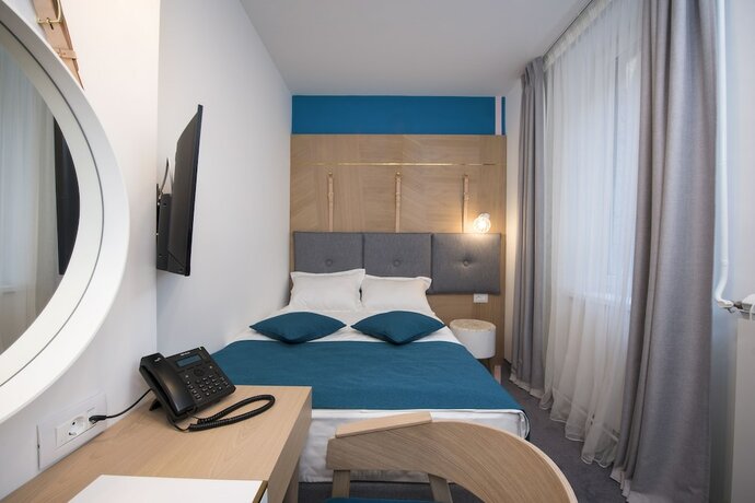 Imagen de la habitación del Hotel City Nest Modern and Cozy Suites. Foto 18