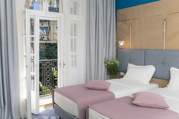 Imagen de la habitación del Hotel City Nest Modern and Cozy Suites. Foto 20