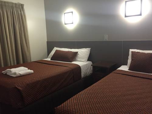 Imagen de la habitación del Hotel City Oasis Inn. Foto 1