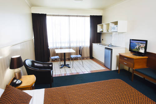 Imagen de la habitación del Hotel City Oasis Inn. Foto 5