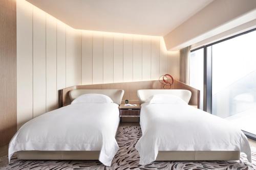 Imagen de la habitación del Hotel City Of Dreams - Morpheus. Foto 6