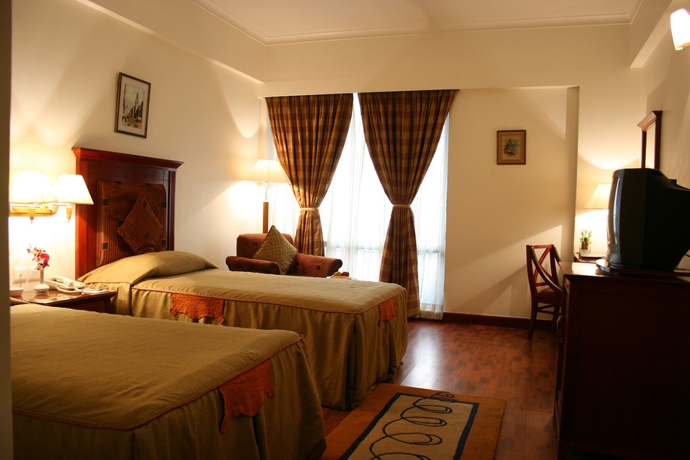 Imagen de la habitación del Hotel City Park, Nueva Delhi. Foto 9