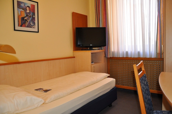 Imagen de la habitación del Hotel City Partner Strauss. Foto 8