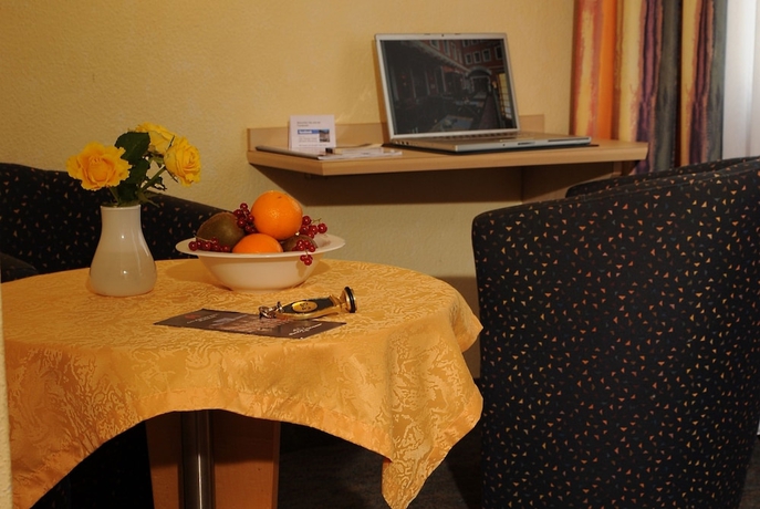 Imagen de la habitación del Hotel City Partner Strauss. Foto 11