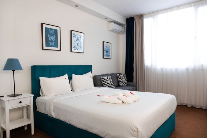 Imagen de la habitación del Hotel City Plaza Apartments and Rooms. Foto 8