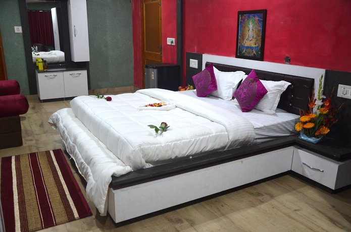 Imagen de la habitación del Hotel City Plaza, Dharamsala. Foto 7