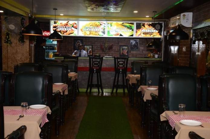 Imagen del bar/restaurante del Hotel City Plaza, Dharamsala. Foto 2
