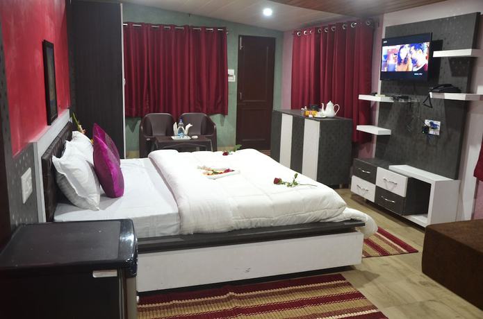 Imagen de la habitación del Hotel City Plaza, Dharamsala. Foto 8