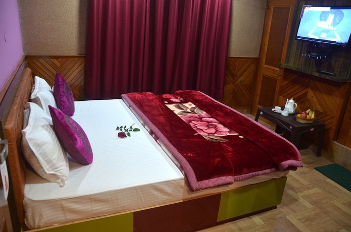 Imagen de la habitación del Hotel City Plaza, Dharamsala. Foto 13