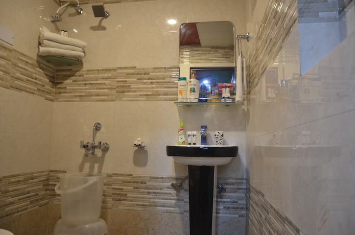 Imagen de la habitación del Hotel City Plaza, Dharamsala. Foto 14