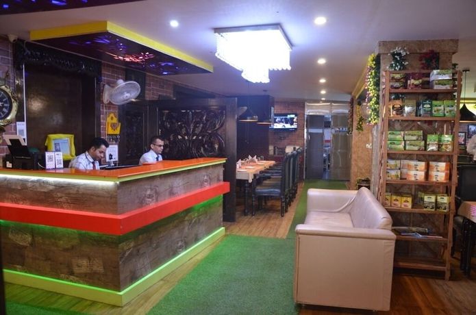 Imagen del bar/restaurante del Hotel City Plaza, Dharamsala. Foto 3