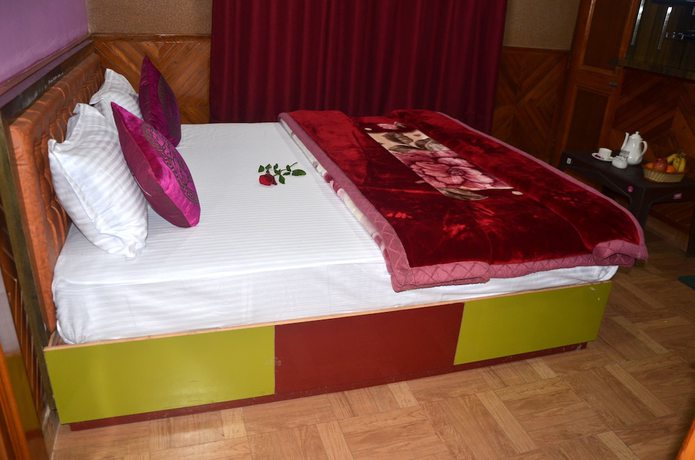 Imagen de la habitación del Hotel City Plaza, Dharamsala. Foto 16