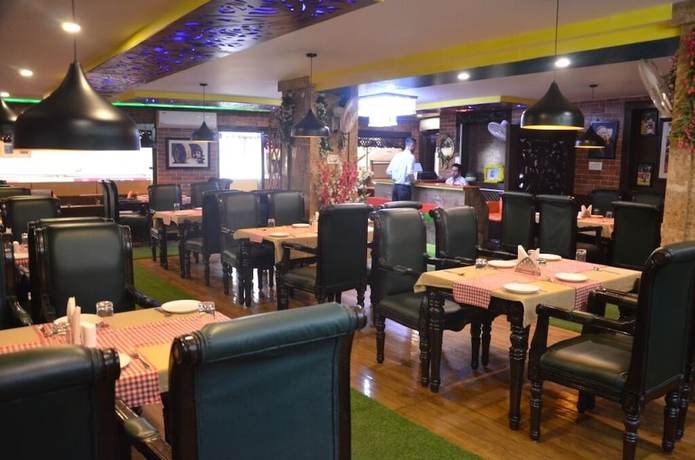 Imagen del bar/restaurante del Hotel City Plaza, Dharamsala. Foto 4